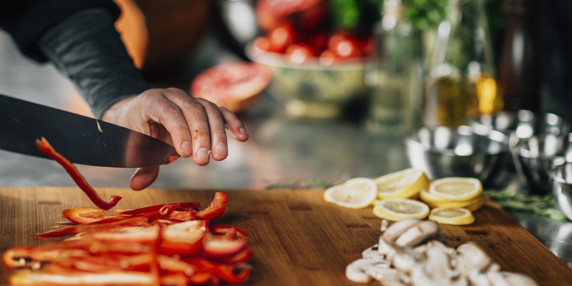 Chef hands prepping ingredients