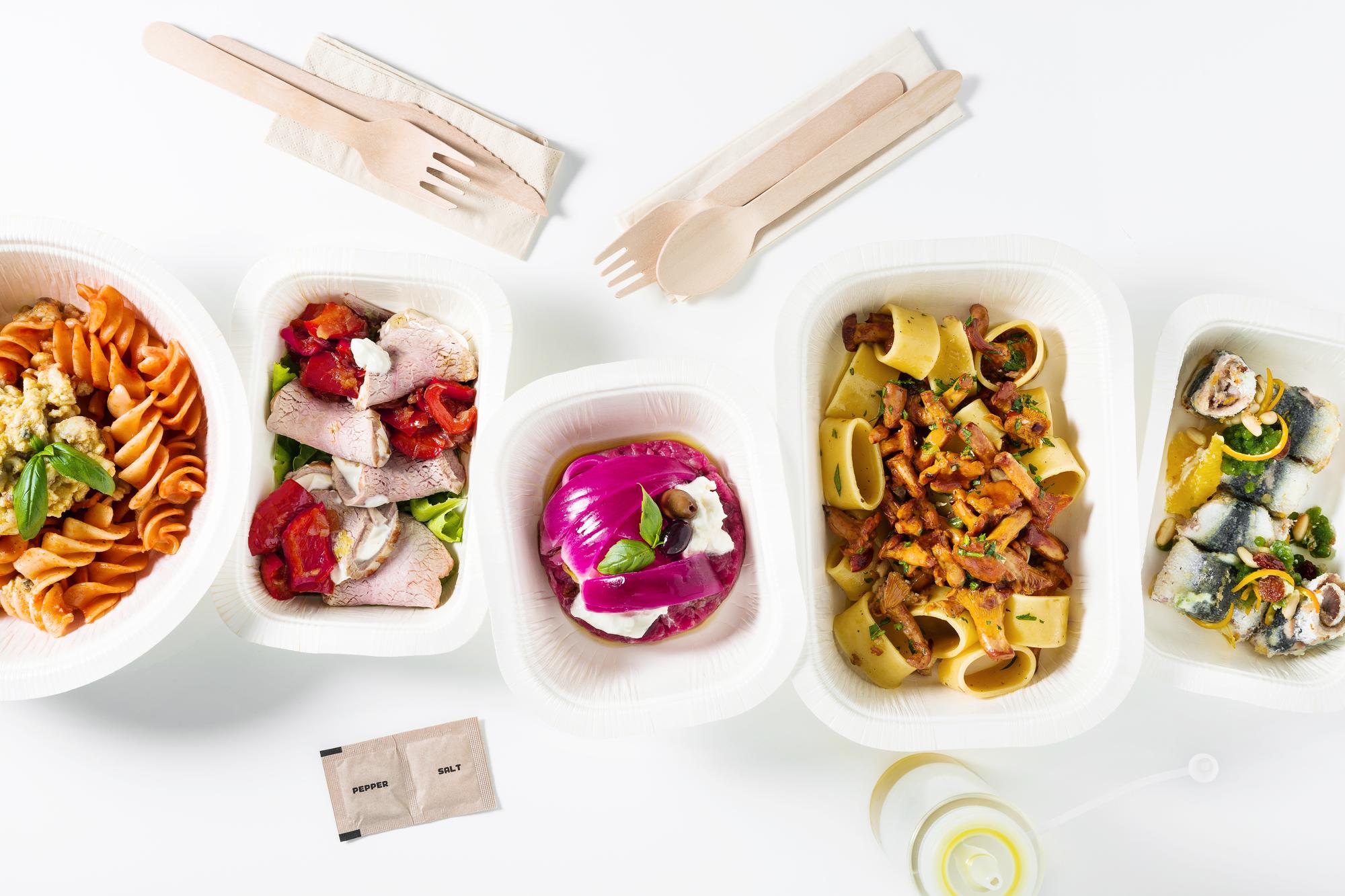 Meal prep boxes arranged on table